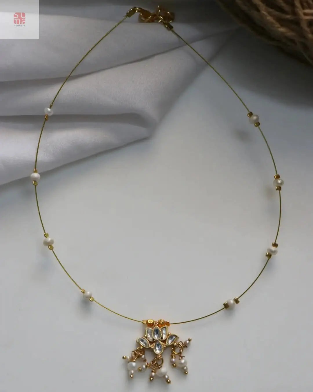 Invisible Necklace With Pearls and Flower Design