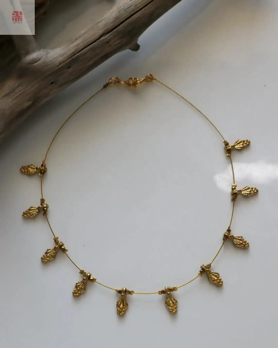 Invisible Necklace with Leaf motifs