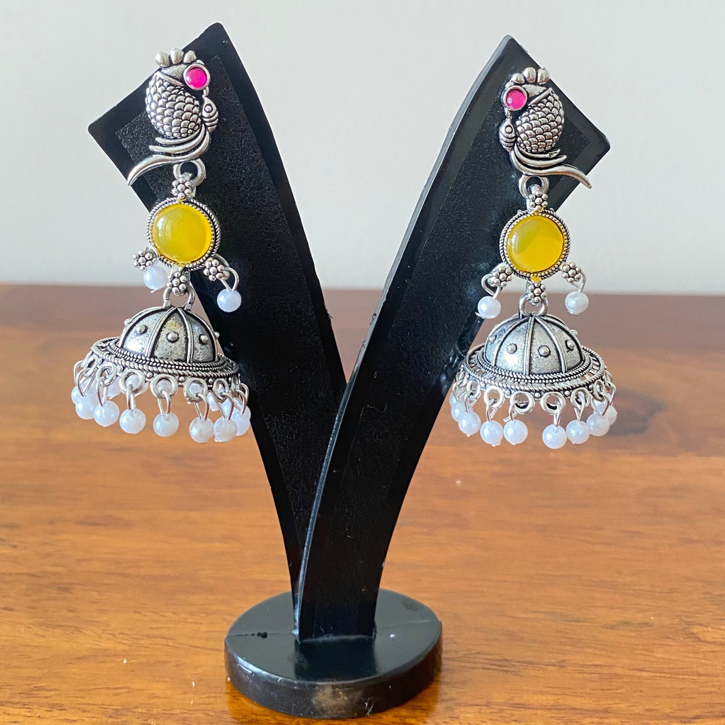 Yellow Peacock Shaped Oxidized Silver Jhumka Earrings